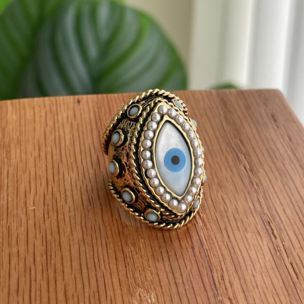 ANILLO OJO CON PERLITAS